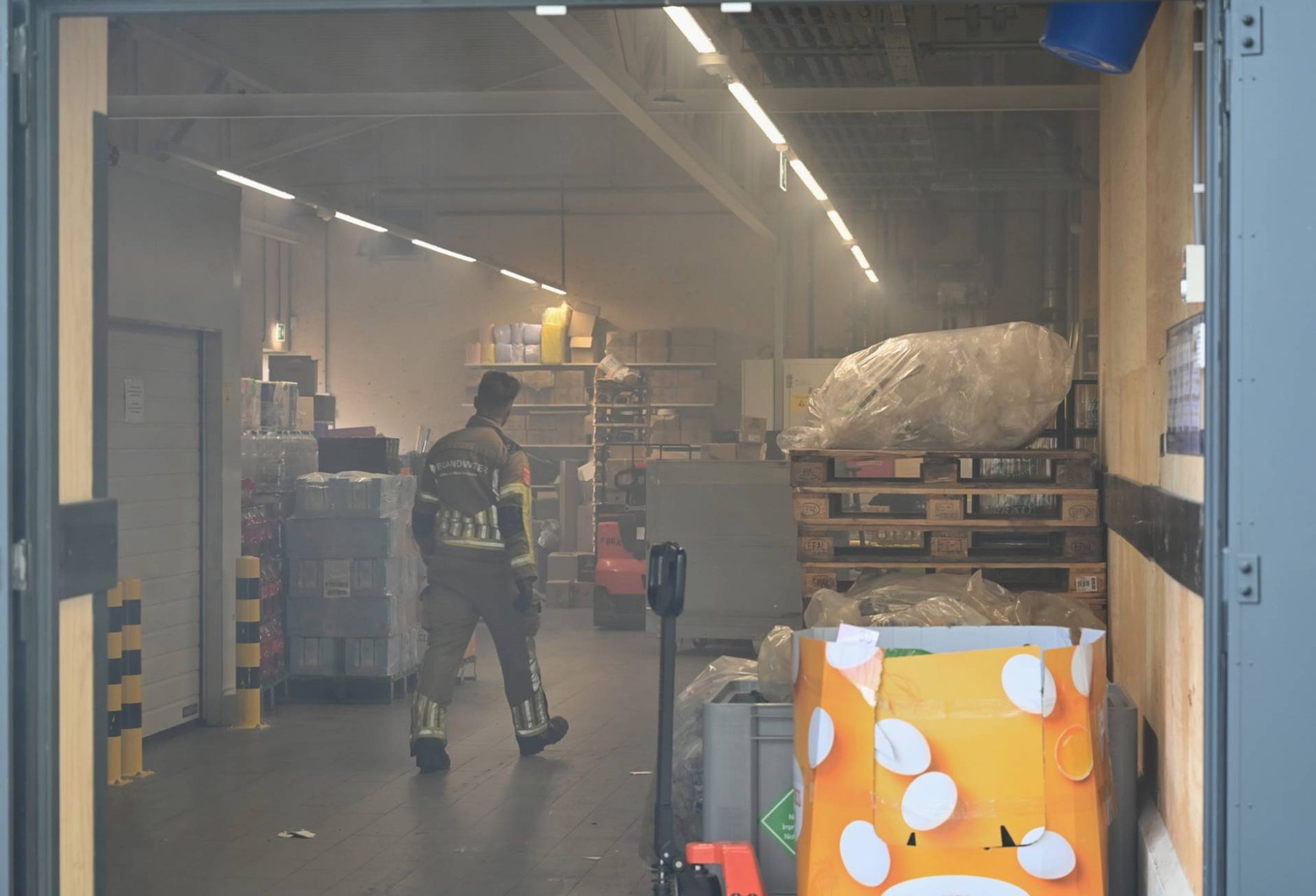 Brand in magazijn van winkel door handscanner