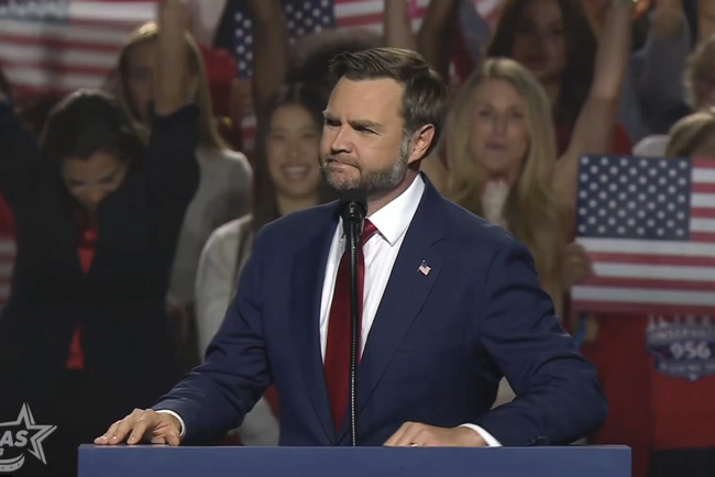 JD Vance confronteert heckler met Mexicaanse vlag en adviseert hem om naar Mexico te gaan als hij het zo geweldig vindt.